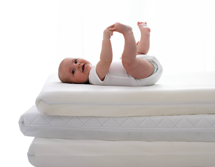 Как выбрать матрас для новорожденного в кроватку - советы (фото)