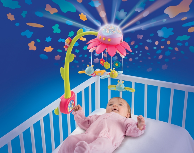 Игрушки и погремушки на кроватку для новорожденных (36 фото): детские музыкальные модели на бортики, мобиле на кровать